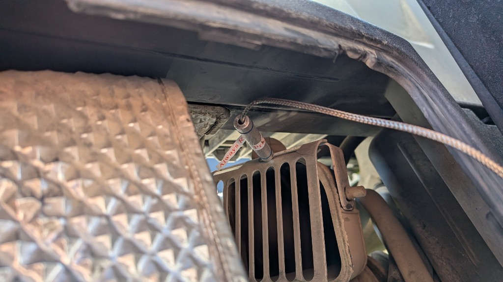 ThermoPro tip at the clutch outlet, quilted heat shield on the left