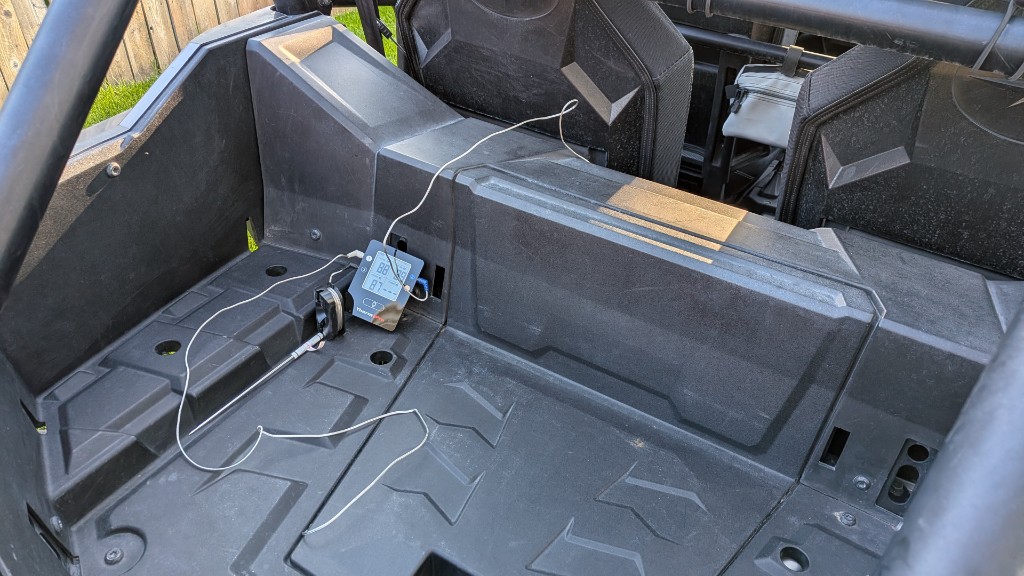 ThermoPro TP25 in the RZR cargo recess, three tips live before the break-in ride