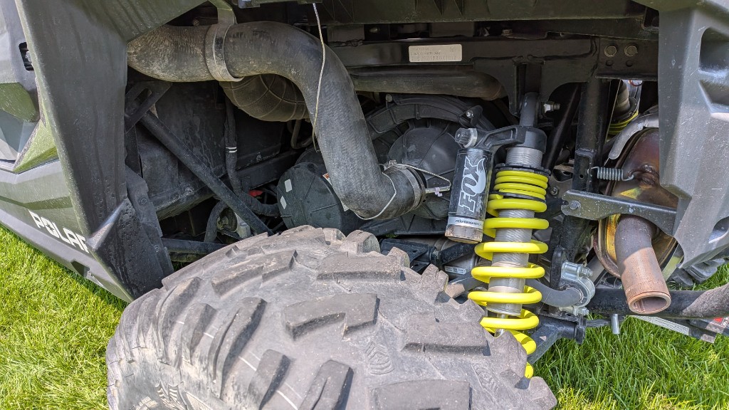 CVT intake hose on the 2017 RZR 4 900, clamping onto the outer clutch cover